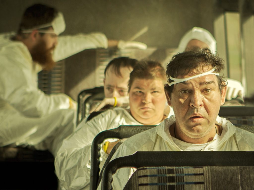 People in a group on a bus